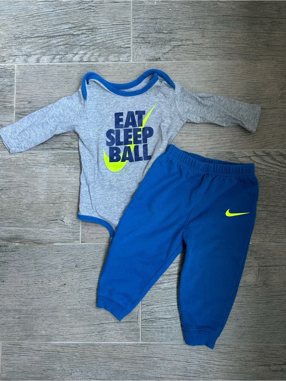 Nike “Eat Sleep Ball” long sleeve bodysuit and pants set 9/12M
